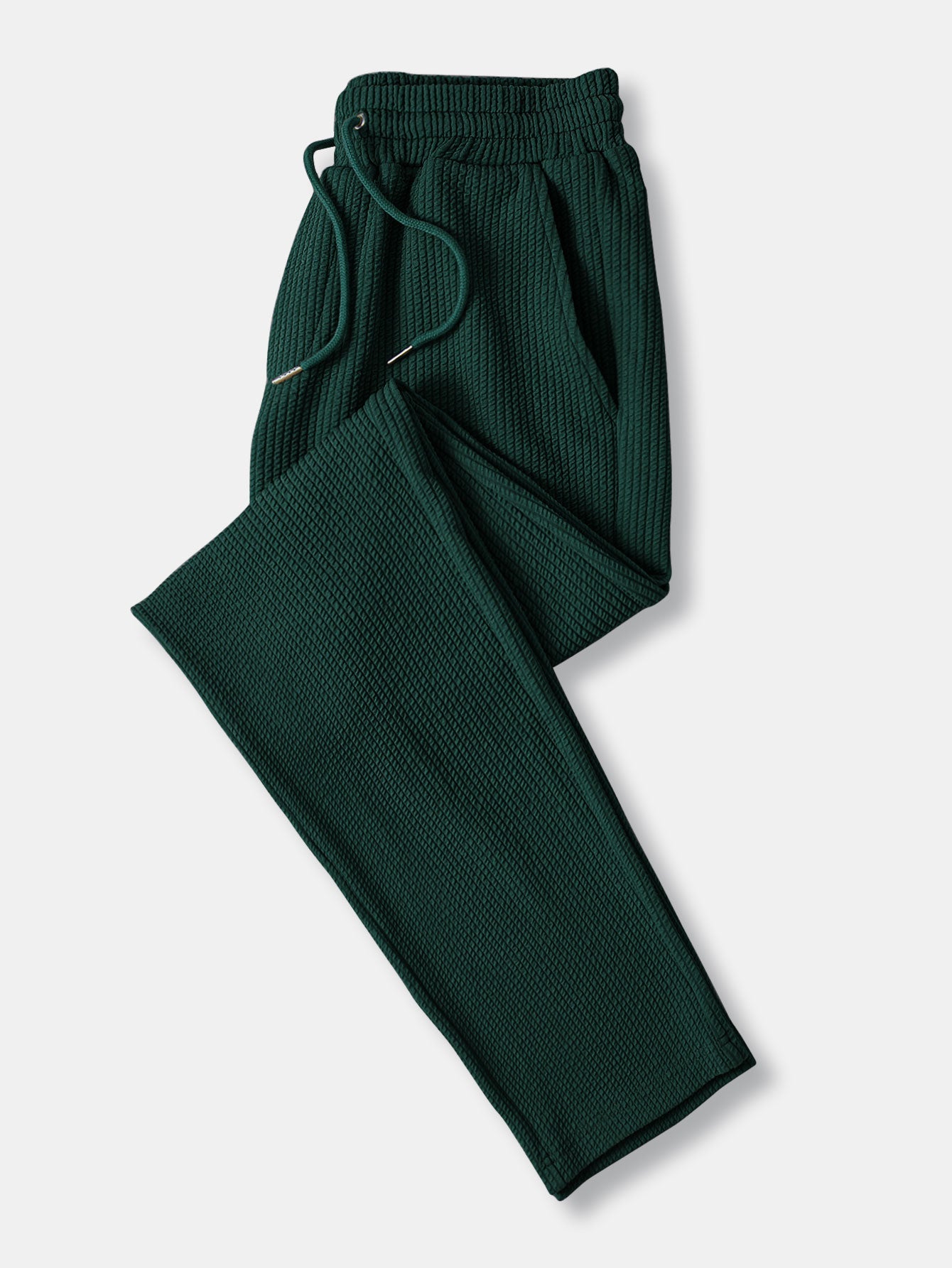Pantalón recto acanalado verde oscuro con cinturilla elástica y cordón, pierna ajustada
