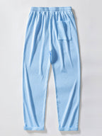 Pantalón recto azul claro con cintura elástica, cordón y bolsillo lateral