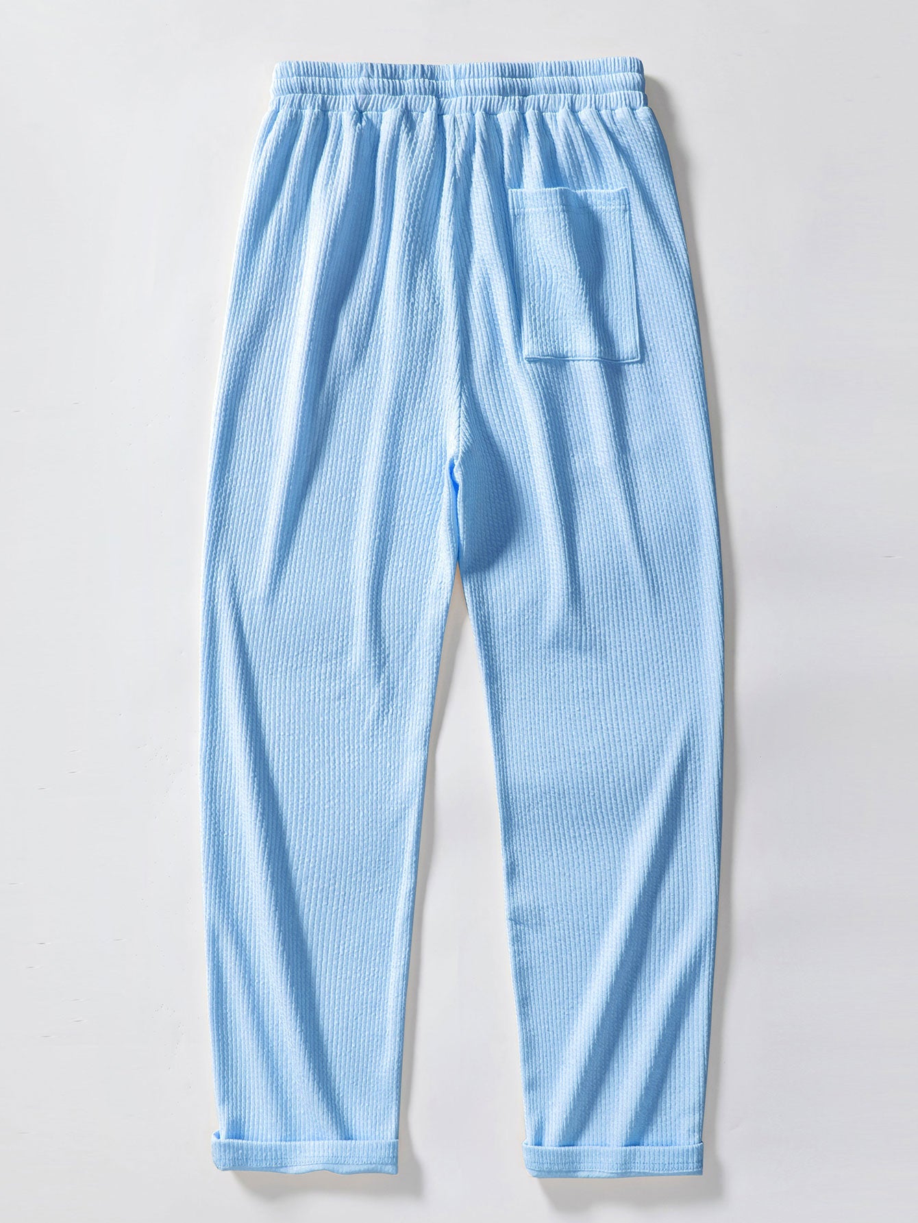 Pantalones rectos azul claro de tejido acanalado con cintura elástica