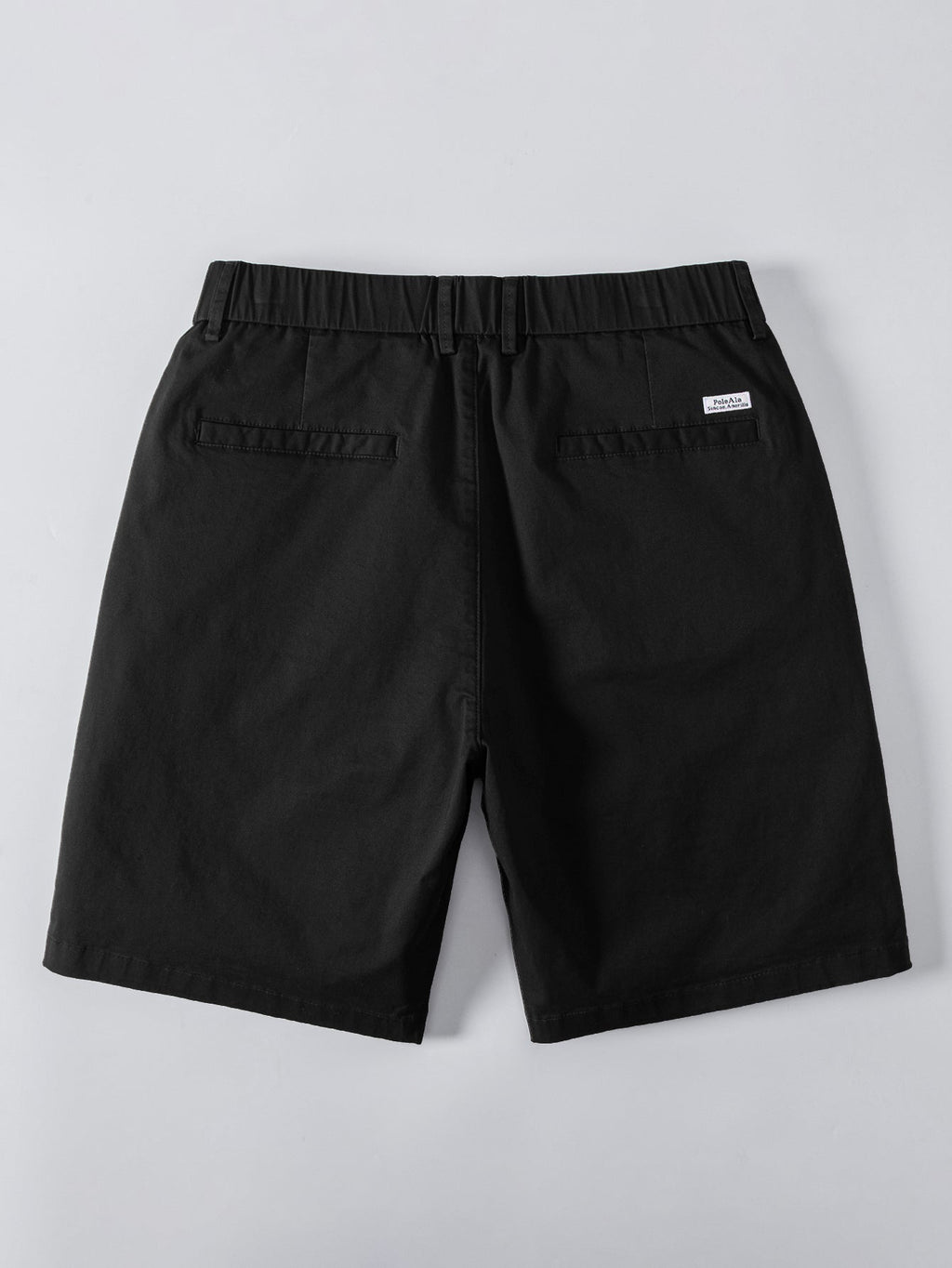 Pantalón corto negro con cintura elástica y bolsillos traseros, vista trasera