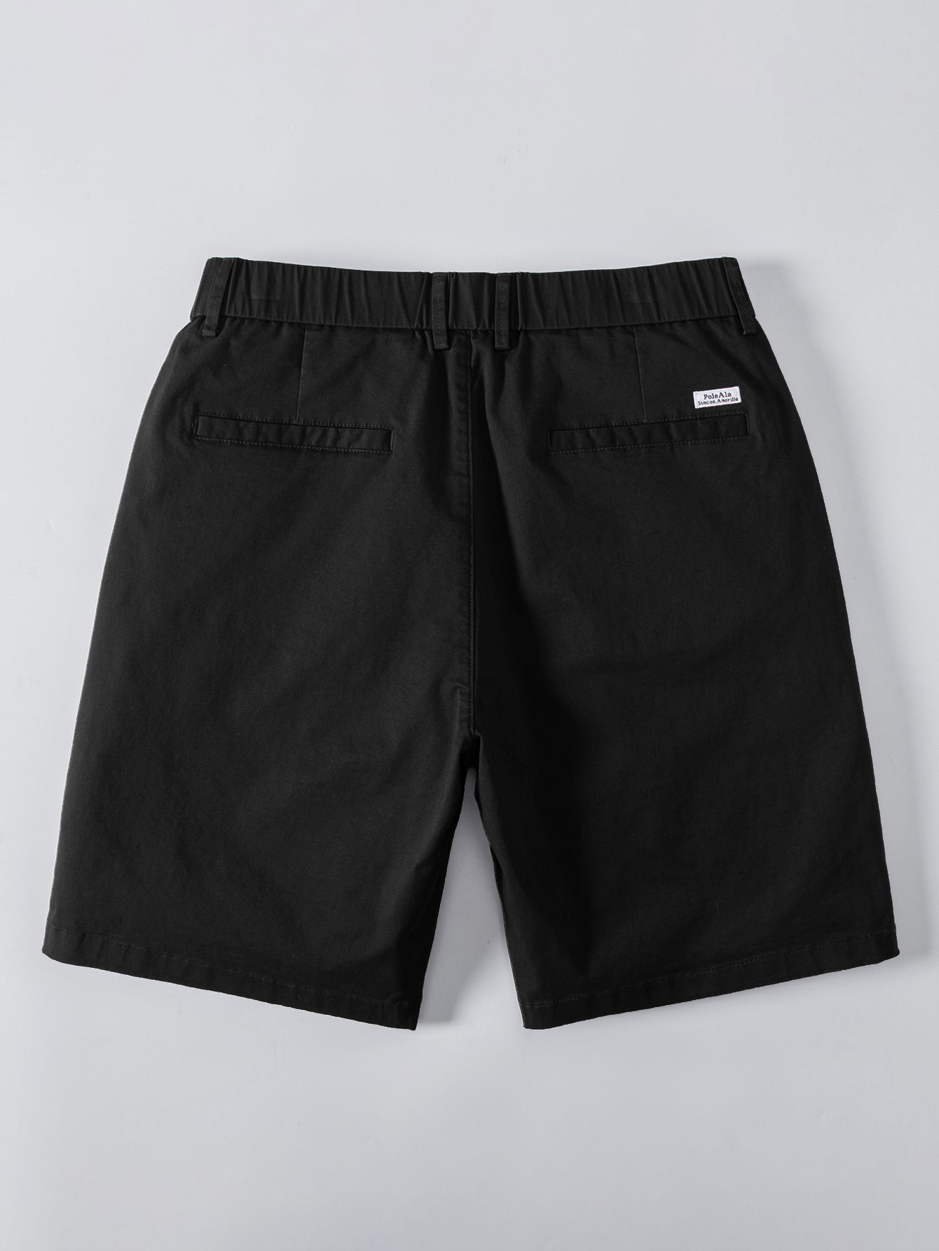 Pantalón corto negro con cintura elástica y bolsillos traseros, vista trasera