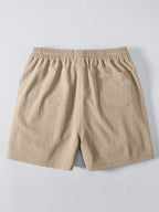 Pantalón corto beige con cintura elástica y bolsillo trasero integrado