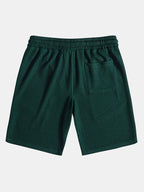 Pantalón corto verde oscuro con bolsillo lateral y cordón en la cintura