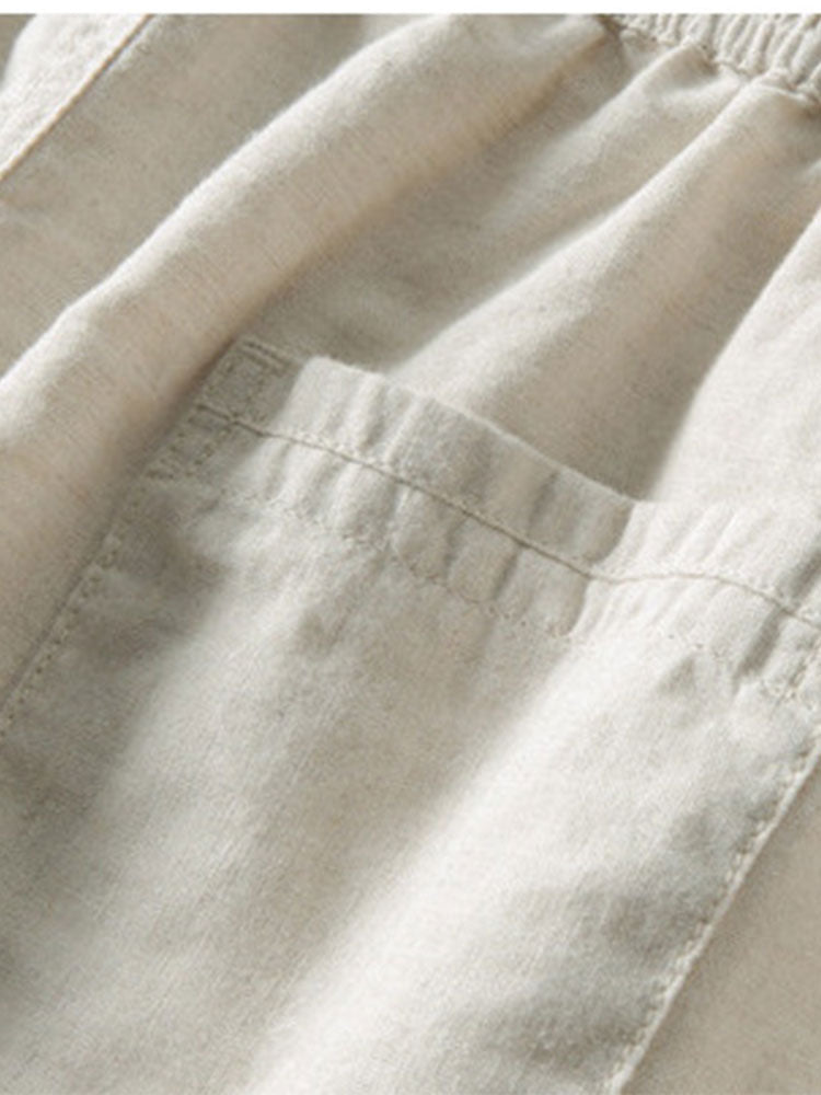 Pantalón recto de lino color crema, bolsillo y costura lateral