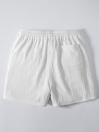 Pantalón corto blanco con cintura elástica y bolsillo trasero en el lateral