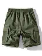 Pantalón corto de tela verde oscuro, cintura elástica y bolsillos cargo laterales.
