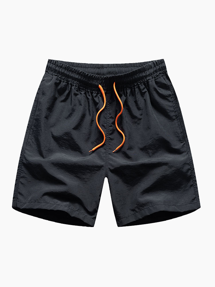 Bañador corto negro con cintura elástica y cordón naranja