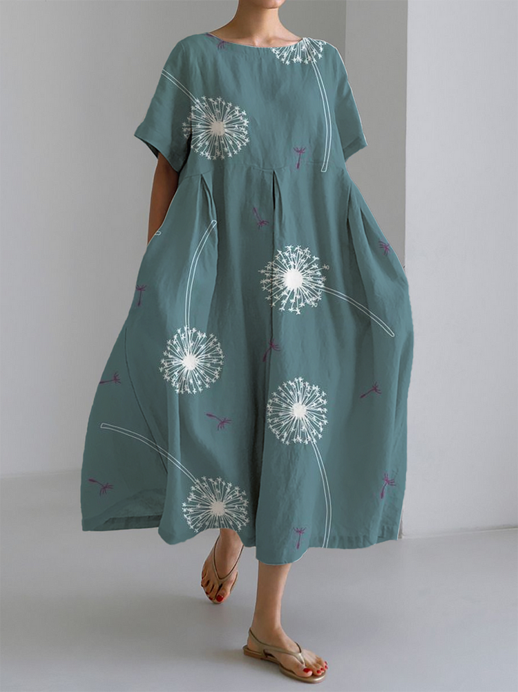 Vestido fluido verde con estampado floral blanco y manga corta, escote redondo