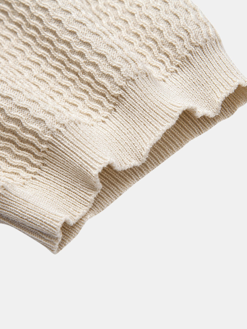 Polo Portofino de punto beige de manga corta, puño acanalado