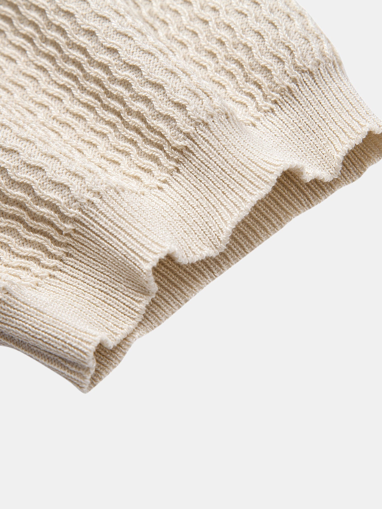 Polo Portofino de punto beige de manga corta, puño acanalado