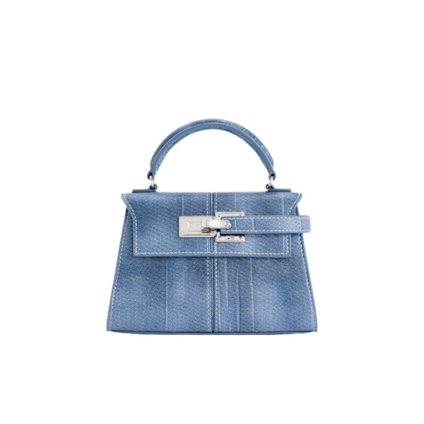 Bolso azul con asa superior y cierre metálico rectangular, vista frontal