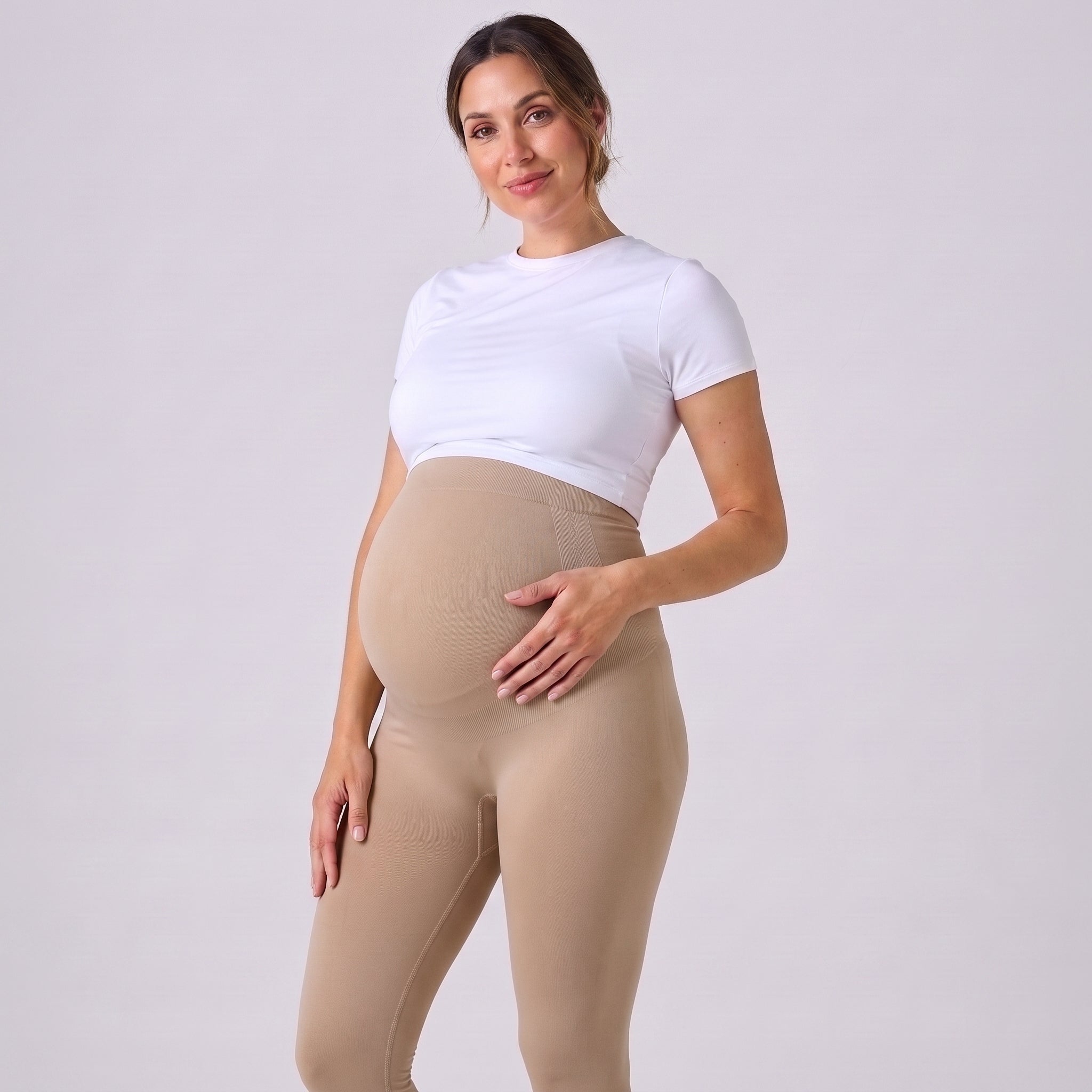 Leggings de embarazo beige claro, cintura alta elástica y tejido ajustado