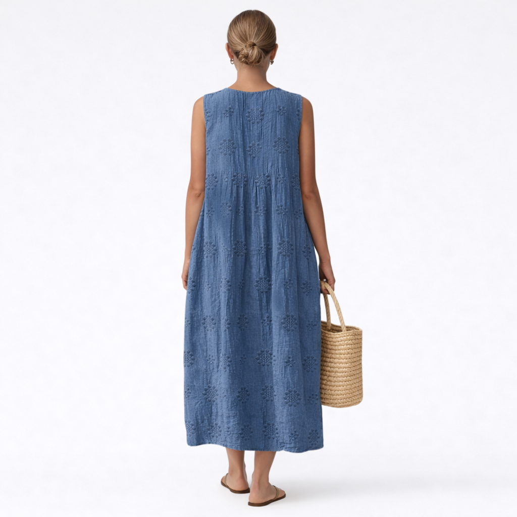 Vestido midi azul sin mangas con costuras y vuelo, vista trasera