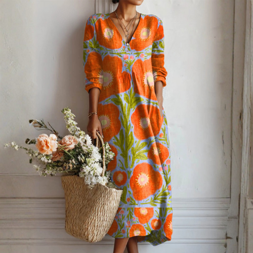 Vestido midi naranja con estampado floral verde, cuello V y mangas 3/4