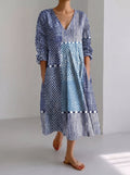 Vestido fluido Ilaria estampado azul, escote V y mangas abullonadas, corte midi evasé