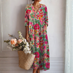 Vestido midi floral con escote en V y mangas tres cuartos, cintura fruncida