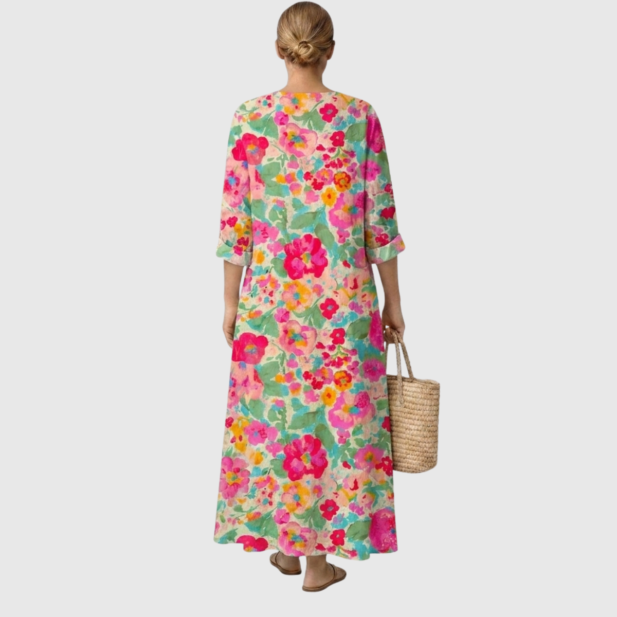 Vestido midi floral multicolor, espalda lisa, mangas 3/4 y caída suelta