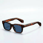 Gafas Vanguard Eclipse con montura carey y lentes azules oscuras, estilo cuadrado