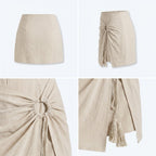 Falda corta beige con frunce frontal y lazo con flecos, vista frontal y lateral