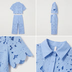 Conjunto azul claro con blusa de cuello camisero y pantalón largo con bordado