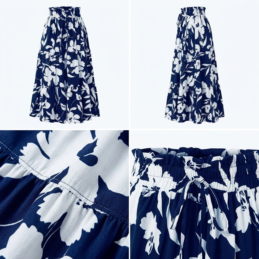 Falda plisada azul marino con flores blancas; detalle de cintura fruncida