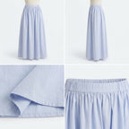 Falda midi azul claro de algodón con pliegues y cintura elástica