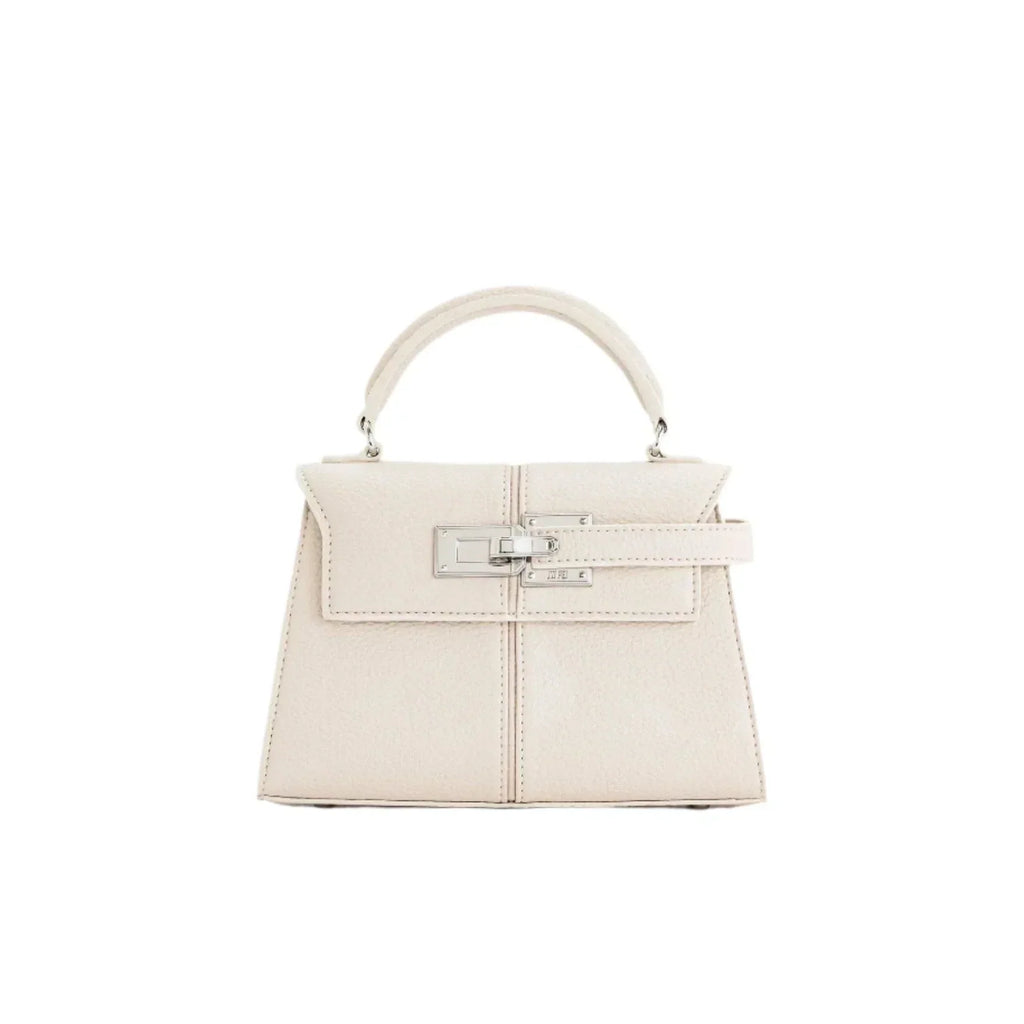 Bolso Ciela Spiral blanco con asa superior y solapa frontal con hebilla metálica