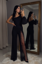 Mono palazzo negro sin mangas con panel de tul brillante en la pierna
