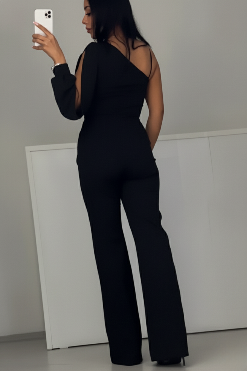 Mono palazzo negro con espalda descubierta y panel de tul brillante lateral