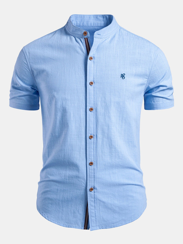 Camisa Capri celeste de manga corta con botonadura frontal y cuello alzado