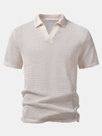 Polo de punto calado beige con cuello en V y manga corta
