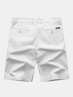 Pantalón corto blanco de algodón, cierre con botón y bolsillos traseros