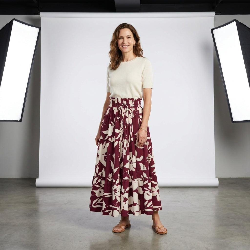 Falda plisada larga granate con estampado floral blanco, cintura elástica y vuelo