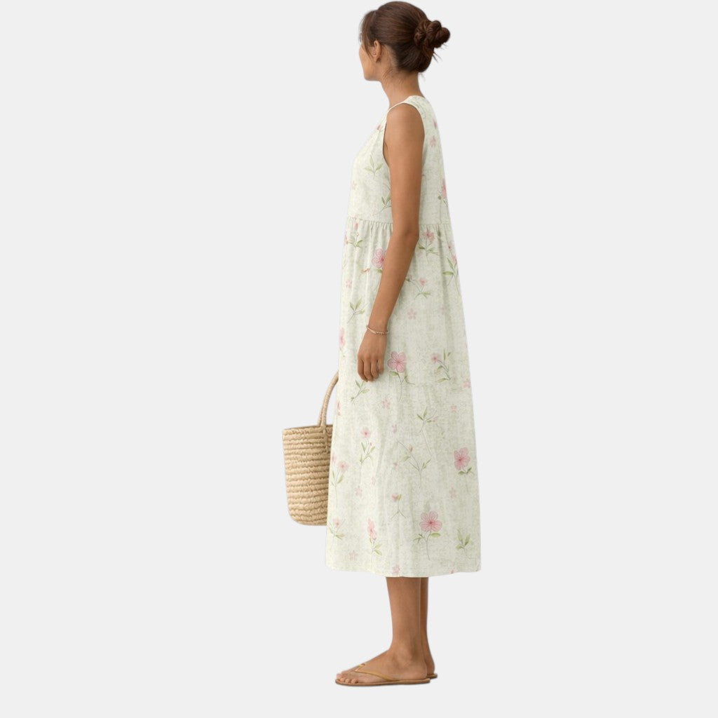 Vestido midi sin mangas con estampado floral rosa y verde, corte recto con caída suelta