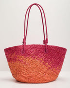 Bolso tote de rafia tejido en rosa y naranja con asas fucsia