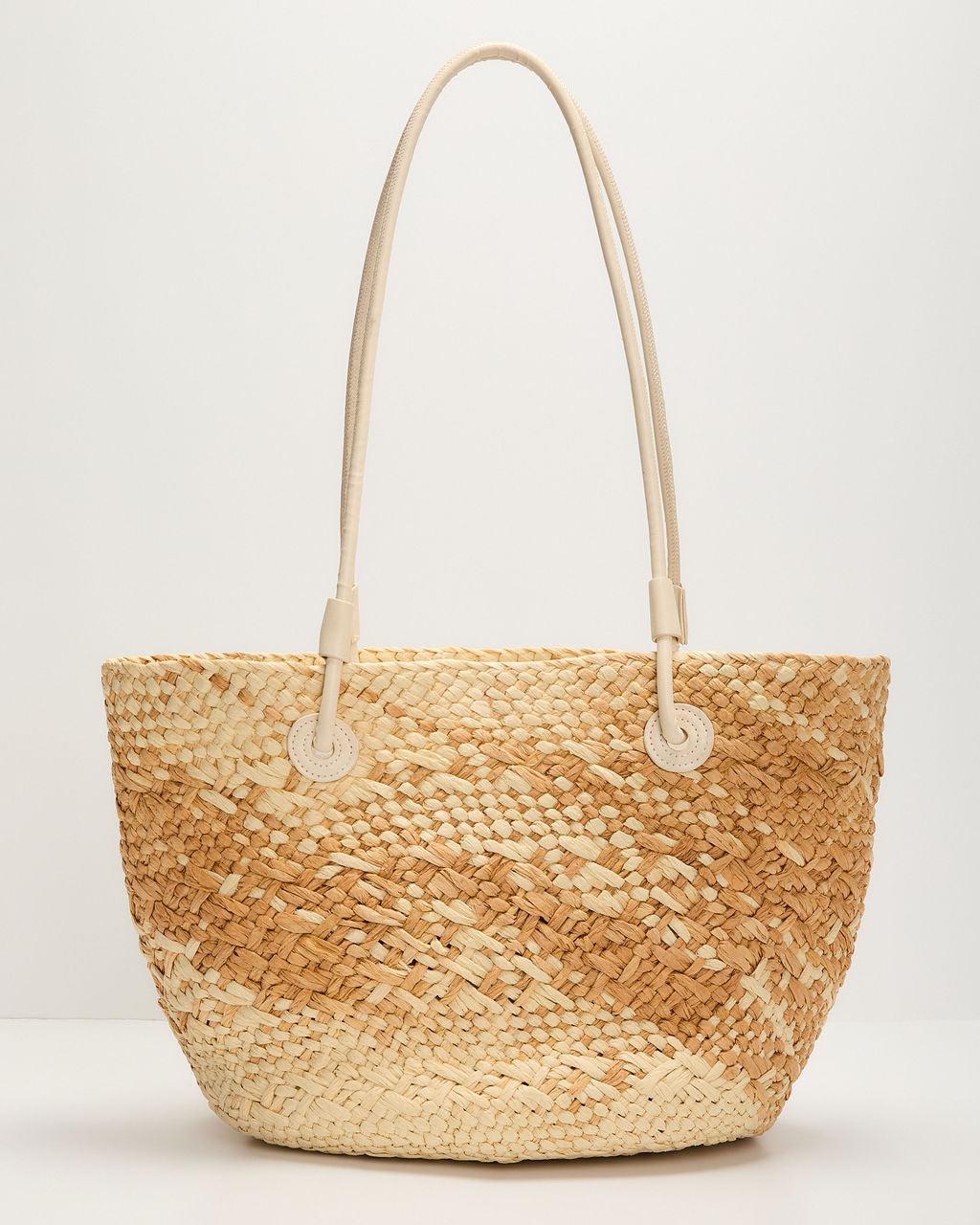 Bolso de rafia tejido color natural con asas cortas y detalle tubular