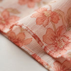 Vestido largo estampado floral durazno con dobladillos y volantes en capas