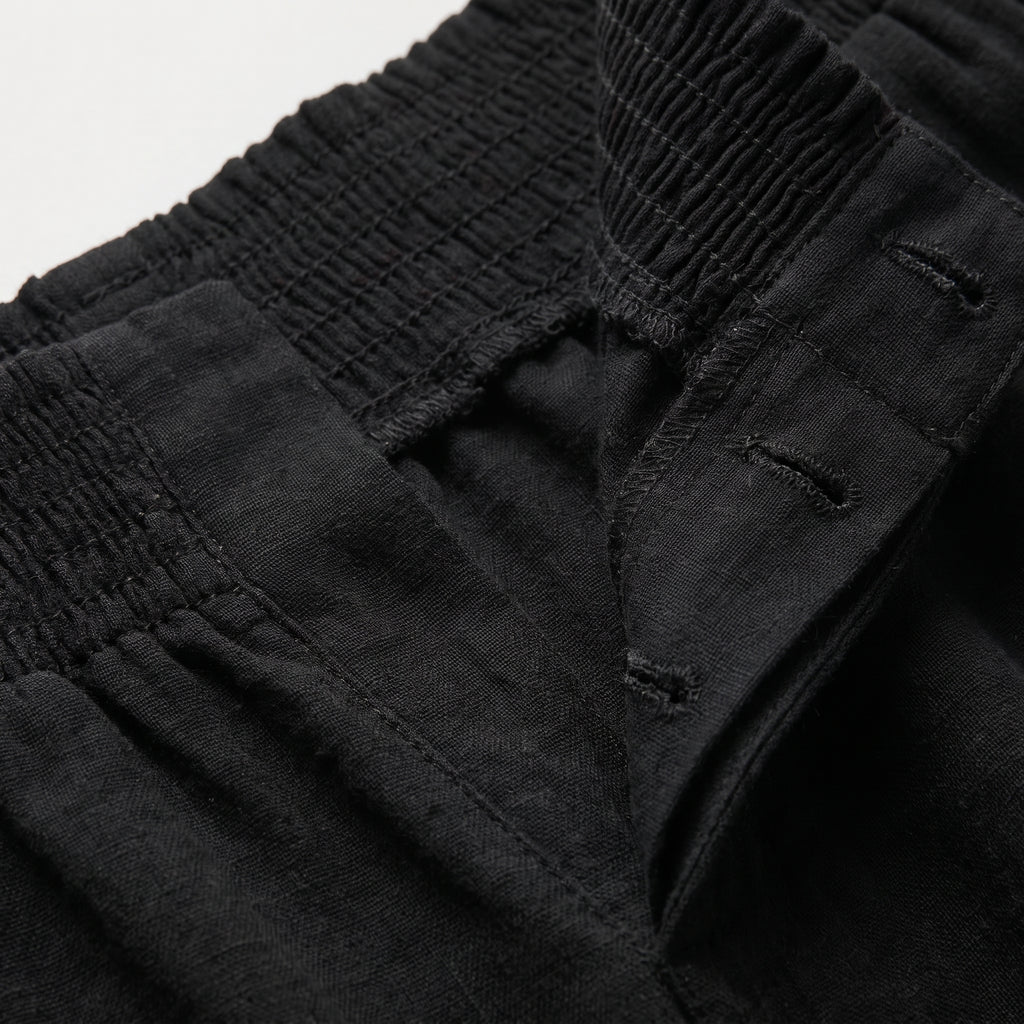 Pantalón Lein de lino natural negro con cintura elástica y tiro alto