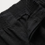Pantalón Lein de lino natural negro con cintura elástica y tiro alto