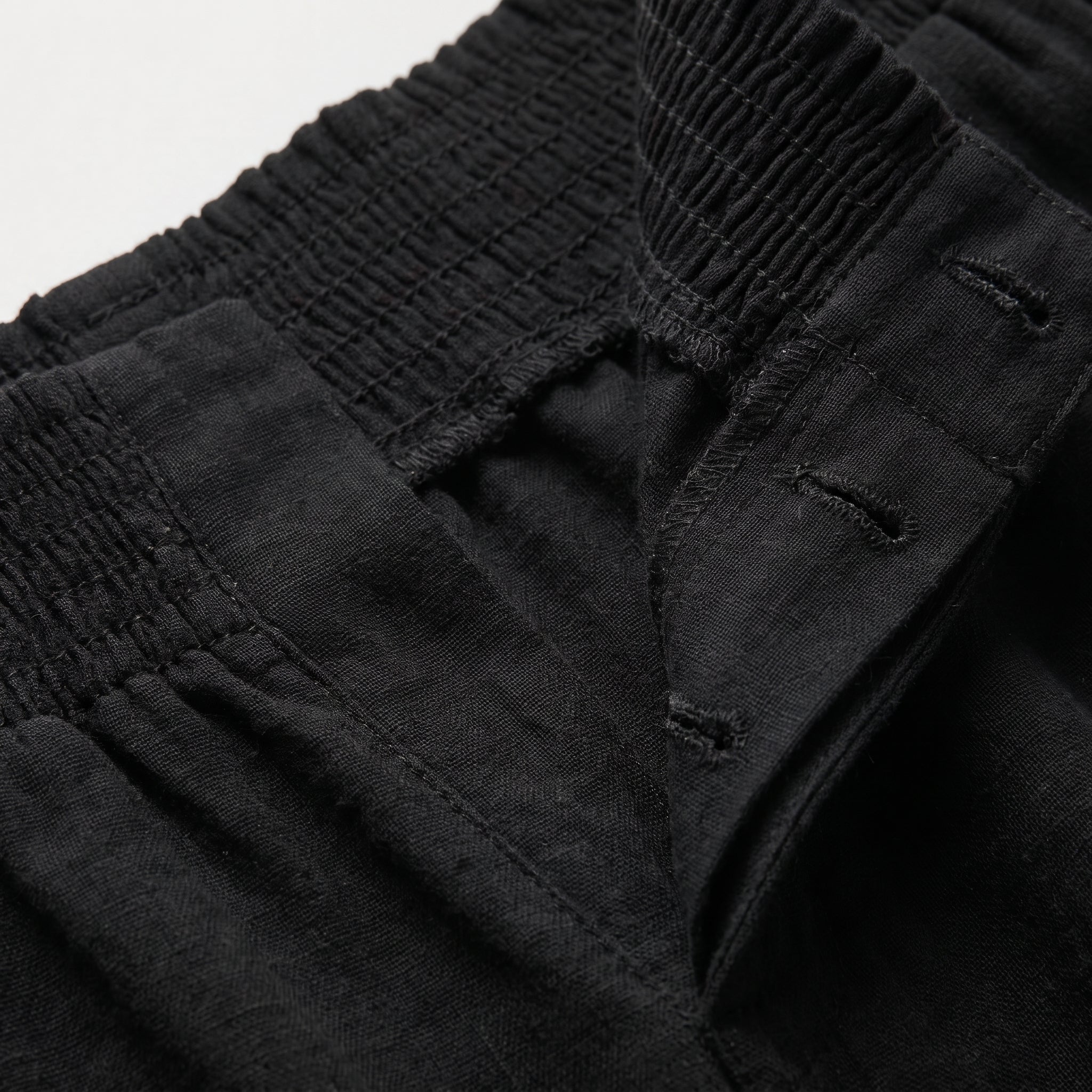 Pantalón Lein de lino natural negro con cintura elástica y tiro alto