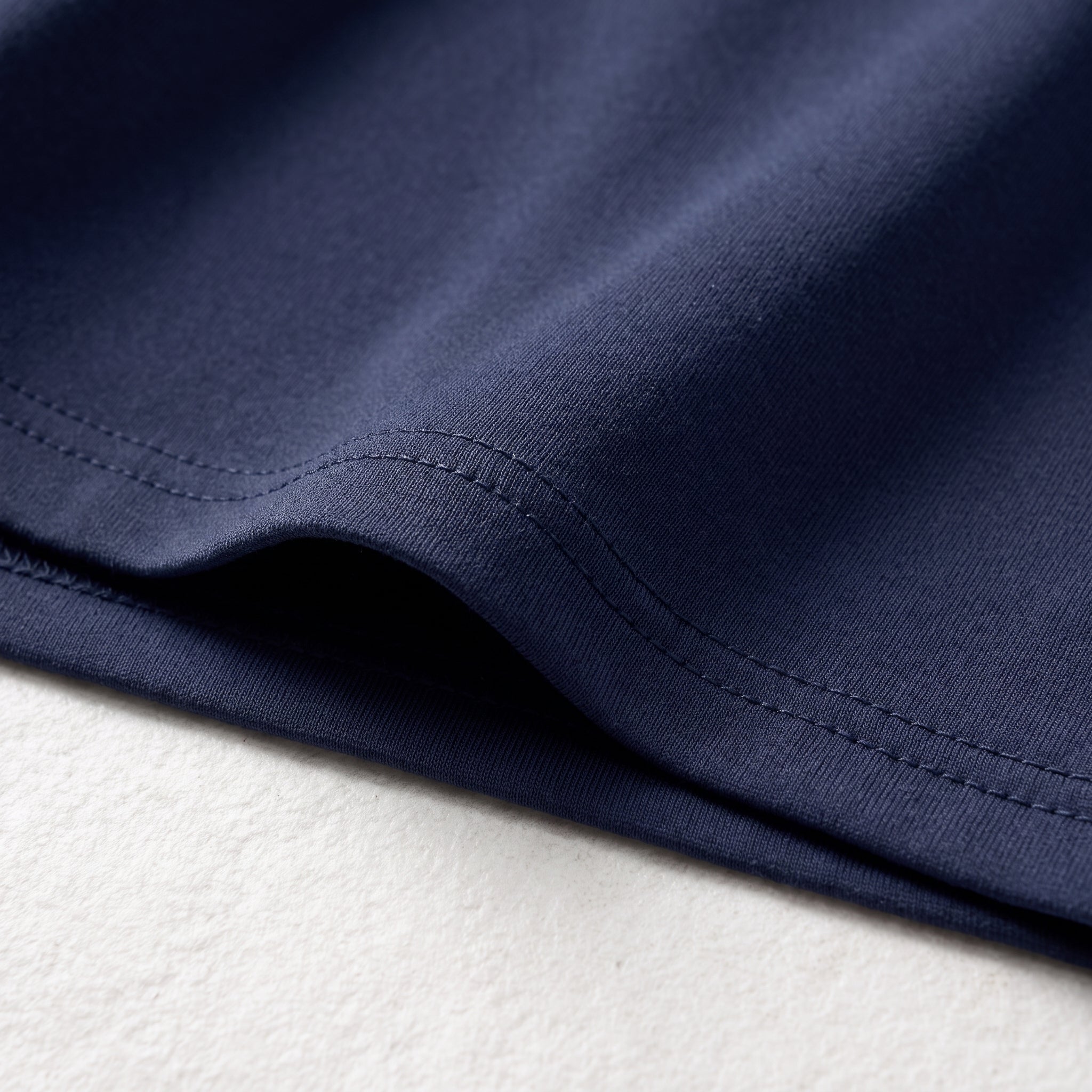 Falda corta interior azul oscuro con cintura elástica y tablas