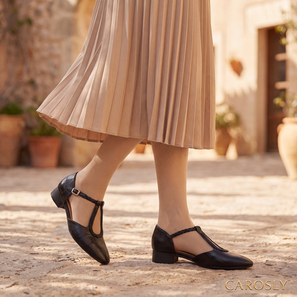 Zapatos negros de tacón bajo con correa trenzada y hebilla, punta cerrada