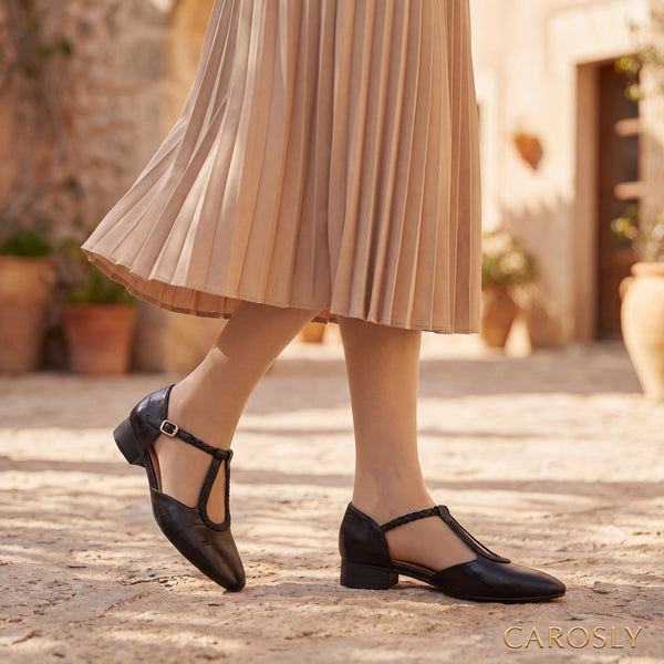 Zapatos negros de tacón bajo con correa trenzada y hebilla, punta cerrada