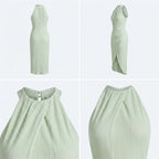 Vestido largo verde claro sin mangas, corte ajustado y abertura lateral en la falda