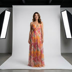 Vestido Belle Époque naranja multicolor con escote cruzado y falda plisada larga