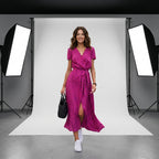 Vestido Fleur d'Été fucsia con lunares, escote en V y abertura central