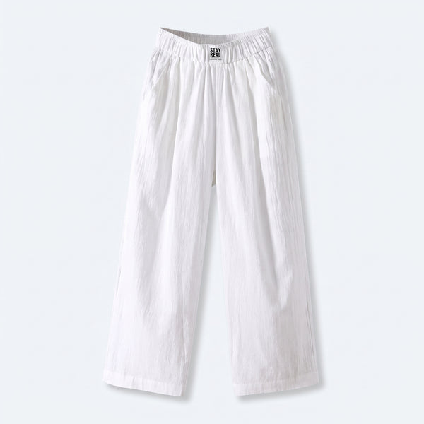 Pantalón relajado de lino y algodón blanco con cintura elástica y caída suelta