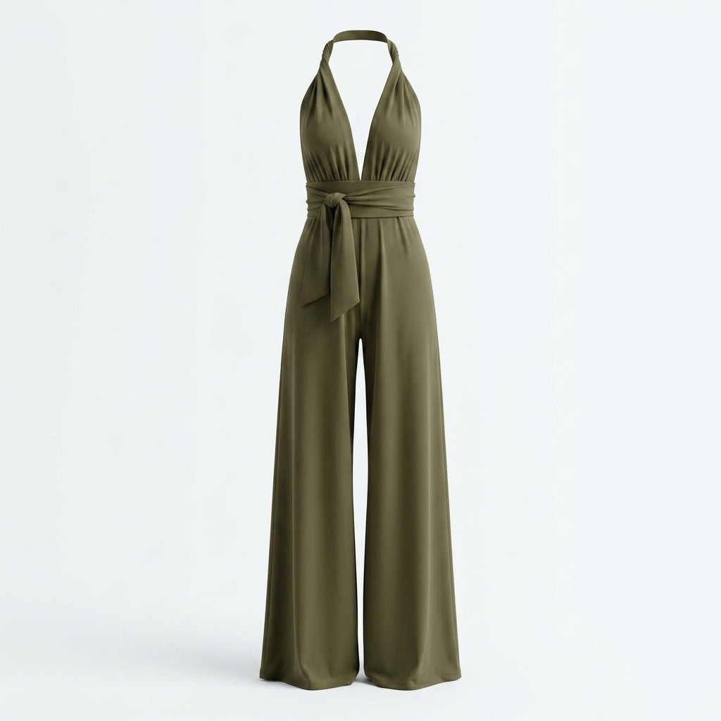 Mono verde sin mangas con cuello halter y lazo en la cintura, perneras anchas.