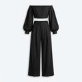 Conjunto de lino negro en plano: top sin tirantes y pantalón pernera ancha