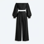 Conjunto de lino negro en plano: top sin tirantes y pantalón pernera ancha